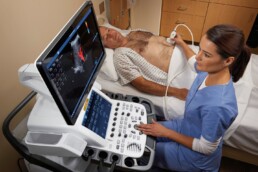 Diagram showing how an ultrasound probe generates an internal body image using sound waves